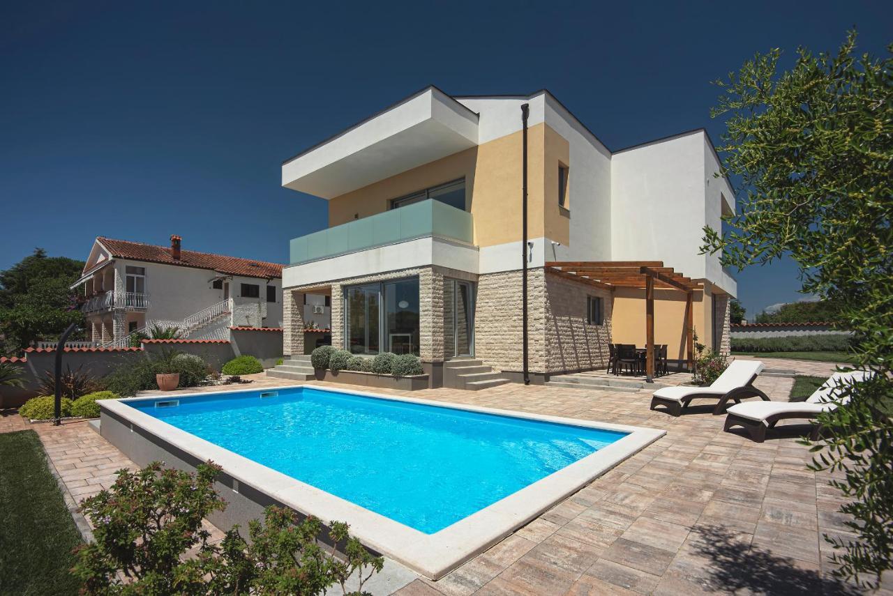 Villa White Barbariga Buitenkant foto