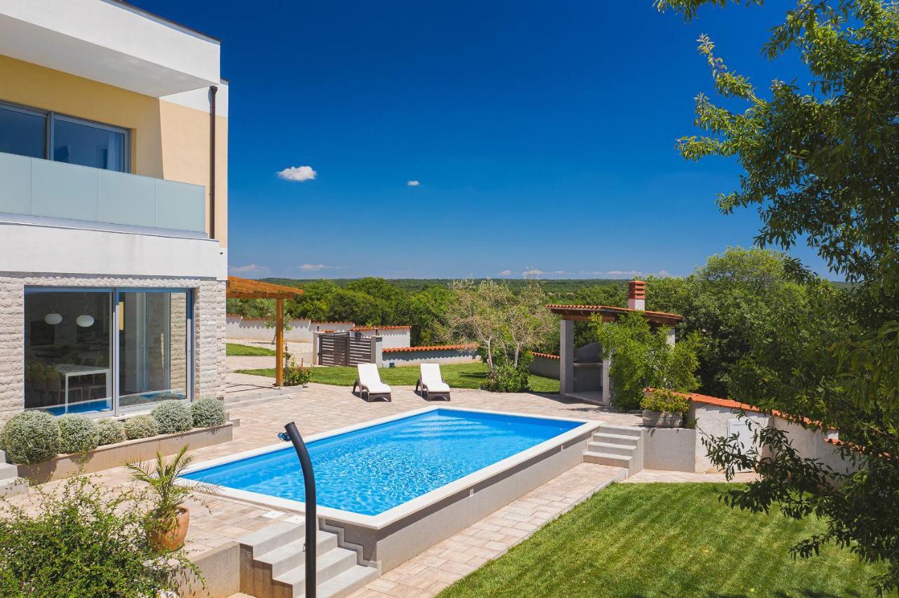 Villa White Barbariga Buitenkant foto